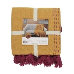 TOILINUX Jeté De Canapé Surpiqué Avec Pompons Jaune Et Rose -Maisons Du Monde Boutique jete de canape surpique avec pompons jaune et rose 2