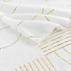 Home Maison Plaid En Flanelle Impressions Métallisées Polyester Blanc/or 150 X 125 -Maisons Du Monde Boutique plaid en flanelle impressions metallisees polyester blanc or 150 x 125 2